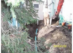 We got good news and bad news.  The new sewer line we decided to add could connect to one in the street.  Saved us money.  Unfortunately the sewer and water lines had been laid in the same trench years ago, a no no.  Needed new water line and new ditch for it.  Upshot?  We saved no money.