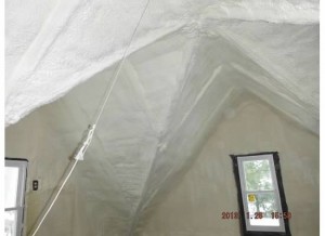 And here's what the attic looks like now that the insulation is finished.  Take that furry beasties!